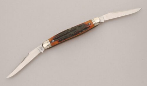 Canal Street Cutlery First Anniversary Muskrat with Amber Stag Bone Scales handle material - Obverse Side - Item #KLC13440
