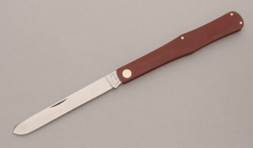A.G. Russell Airweight Fruit Knife with Coral Rucarta Frame handle material - Obverse Side - Item #KLC13501