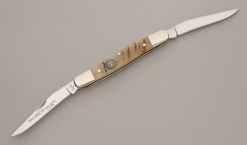 Canal Street Cutlery 2009 NKCA Club Muskrat Folder with Smooth Oiled Rams Horn Scales handle material - Obverse Side - Item #KLC13537