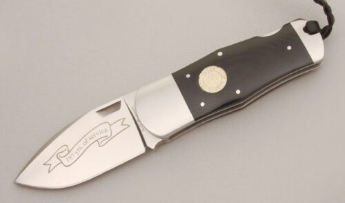A.G. Russell 2010 Texas Ranger Lockback with Ebony Rucarta Handle Scales handle material - Obverse Side - Item #KLC13545