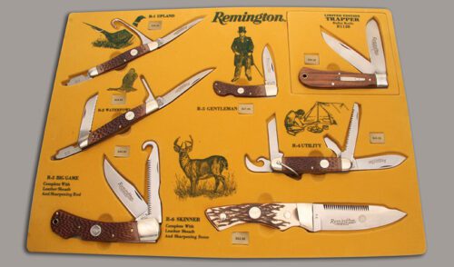 Remington Knives 7 Knife Display Set with Jigged Delrin & Cocobolo Wood handle material - Obverse Side - Item #KLC13599