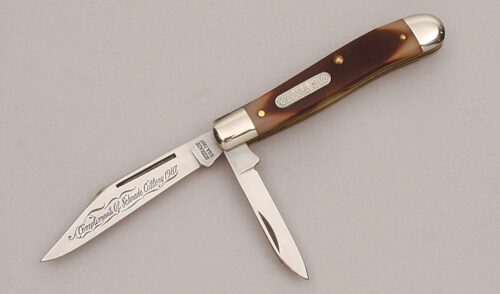Schrade Cutlery Old Timer Small Trapper with Sawcut Delrin Scales handle material - Obverse Side - Item #KLC13614