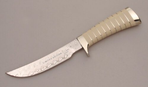 Buck Knives Expert Hunter with Nickel Silver & Ivory Micarta handle material - Obverse Side - Item #KLC13634