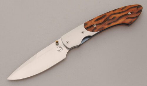 William Henry Knives T12-A Linerlock with Amber Jigged Bone Scales handle material - Obverse Side - Item #KLC13674
