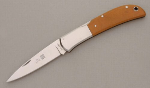 Al Mar Knives 1003 Falcon Midlock Folder with Westinghouse Ivory Micarta handle material - Obverse Side - Item #KLC13797