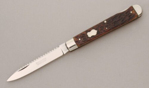 Remington Knives R1383 Lockback Fish Knife with Jigged Bone Handle Scales handle material - Obverse Side - Item #KLC13806