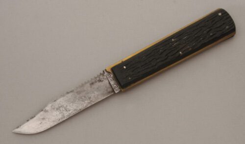 Union Cutlery Co. Kabar Tri-Fold Knife with Jigged Celluloid Handle Scales handle material - Obverse Side - Item #KLC13808