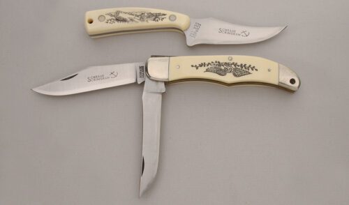 Schrade Cutlery Scrimshaw 2 Knife Set with Ivory Delrin Handles handle material - Obverse Side - Item #KLC13824