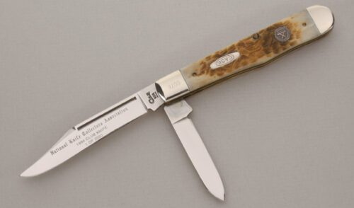 Case Cutlery 1994 NKCA Club Trapper with Rogers Jigged Bone Scales handle material - Obverse Side - Item #KLC13831