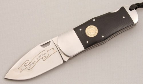A.G. Russell 2010 Texas Ranger Lockback with Ebony Rucarta Handle Scales handle material - Obverse Side - Item #KLC13846