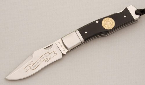 A.G. Russell 2008 Texas Ranger Lockback with Black Micarta Handle Scales handle material - Obverse Side - Item #KLC13847