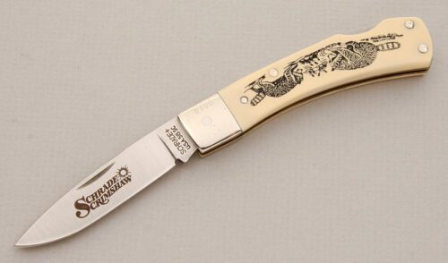 Schrade Cutlery 515 SC Scrimshaw Lockback with Ivory Delrin Scales handle material - Obverse Side - Item #KLC13877