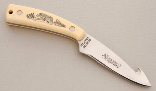 Schrade Cutlery 518 SC Scrimshaw Guthook with Ivory Delrin Scales handle material - Obverse Side - Item #KLC13878
