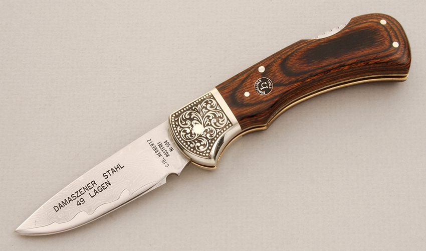 C.Jul. Herbertz Damascus Lockback Folder with Laminated Wood Handle Scales handle material - Obverse Side - Item #KLC13900