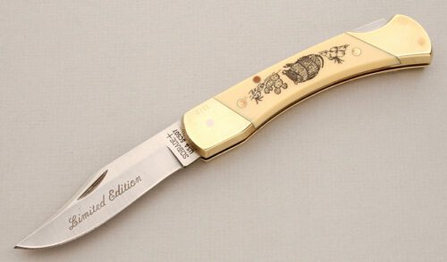 Schrade Cutlery SC507 Scrimshaw Lockback with Ivory Delrin Scales handle material - Obverse Side - Item #KLC13905