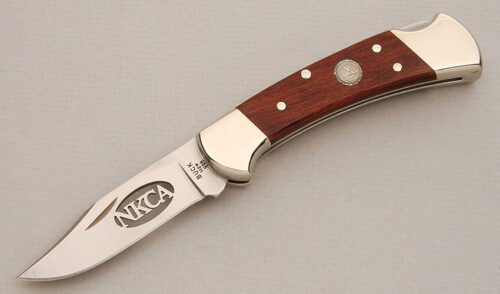Buck Knives 2007 NKCA Club Lockback Knife with Wood Handle Scales handle material - Obverse Side - Item #KLC13911