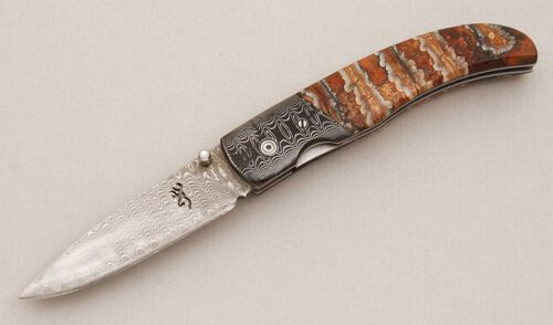 Browning Knives 0242 Damascus Folder with Mammoth Tooth Handle Scales handle material - Obverse Side - Item #KLC13953