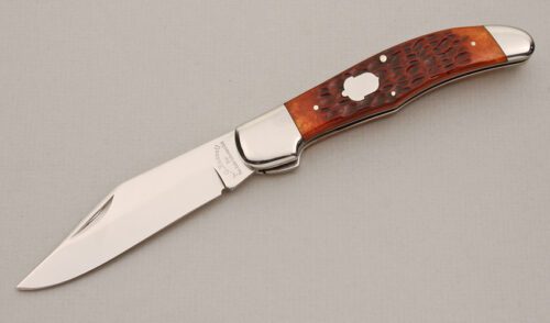 A.G. Russell KCC FH-2 Folding Hunter with Brown Jigged Bone Scales handle material - Obverse Side - Item #KLC13959
