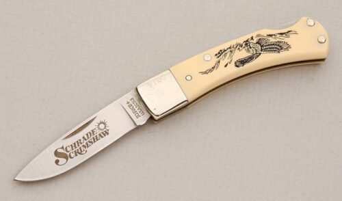 Schrade Cutlery 513 SC Scrimshaw Lockback with Ivory Delrin Handle Scales handle material - Obverse Side - Item #KLC13984