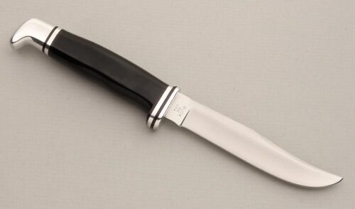 Buck Knives Buck Model 102 Woodsman with Black Phenolic Handle handle material - Obverse Side - Item #KLC14017