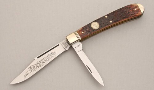 Camillus Cutlery 1998 NKCA Club Trapper with Brown Jigged Bone Scales handle material - Obverse Side - Item #KLC14042