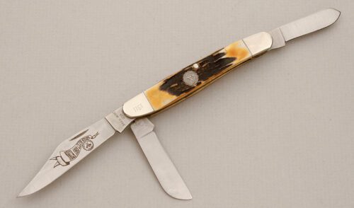 Bear MGC Cutlery 1993 NKCA Club Stockman with Burnt Stag Handle Scales handle material - Obverse Side - Item #KLC14044