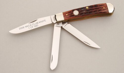 Case Cutlery 2006 NKCA Three Blade Trapper with Walnut Jigged Bone Scales handle material - Obverse Side - Item #KLC14046