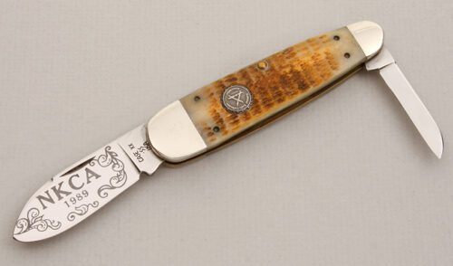 Case Cutlery 1989 NKCA Club Sleeveboard with Rogers Jigged Bone Scales handle material - Obverse Side - Item #KLC14048
