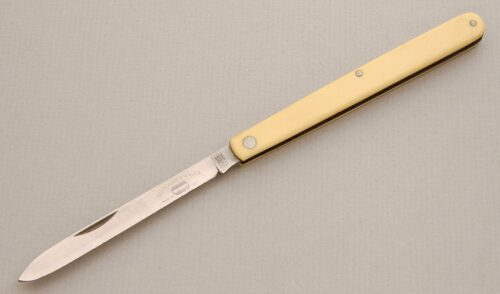 Schrade Cutlery Fruit Tester with Ivory Delrin Handle handle material - Obverse Side - Item #KLC14112