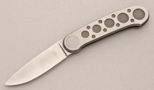 Pacific Cutlery Barry Wood Butterfly Folder with Machined Stainless Frame handle material - Obverse Side - Item #KLC14176