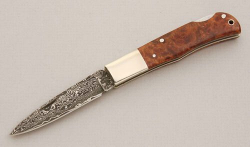 A.G. Russell Damascus Lockback with Quince Wood Scales handle material - Obverse Side - Item #KLC14192