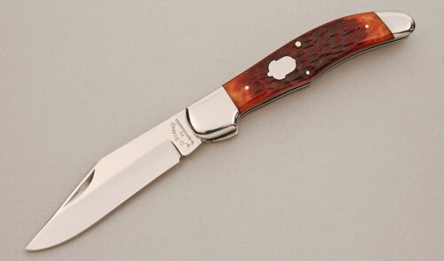 A.G. Russell KCC FH-2 Folding Hunter with Brown Jigged Bone Scales handle material - Obverse Side - Item #KLC14305
