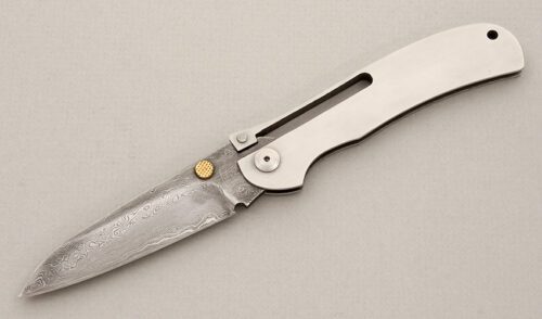 A.G. Russell K87C One Hand Knife with Brushed Stainless Frame handle material - Obverse Side - Item #KLC14316
