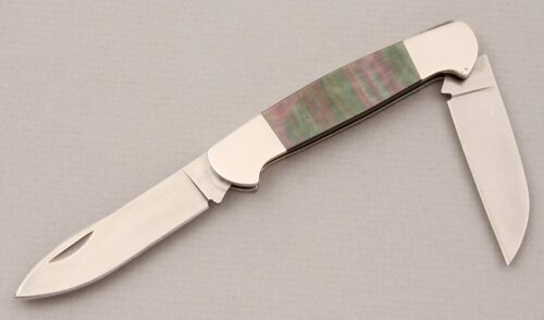 Buck Knives Buck/Russell Signature Knife with Black Lip Pearl Scales handle material - Obverse Side - Item #KLC14468