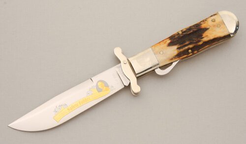 Marble's Knives 100th Year Gold Safety Folder with Stag Scales handle material - Obverse Side - Item #KLC14568