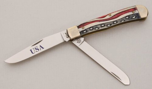Case Cutlery Star Spangled Trapper with Cut & Dyed Natural Bone Scales handle material - Obverse Side - Item #KLC14876