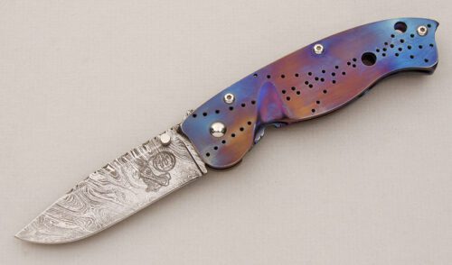 Van Steck Damascus Framelock Folder with Anodized Titanium Frame handle material - Obverse Side - Item #KLC14886