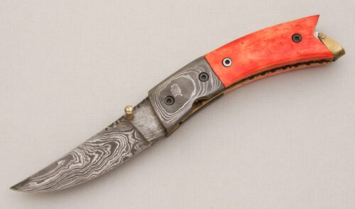 Unknown Maker Upswept Damascus Folder with Dyed Red Bone Scales handle material - Obverse Side - Item #KLC14906