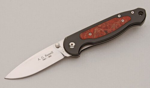 A.G. Russell Greased Light'n with Black Aluminum Frame handle material - Obverse Side - Item #KLC14914