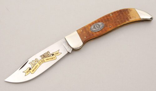 Ka-Bar Knives 100 Year Commemorative Grizzly with Brown Jigged Bone handle material - Obverse Side - Item #KLC14980