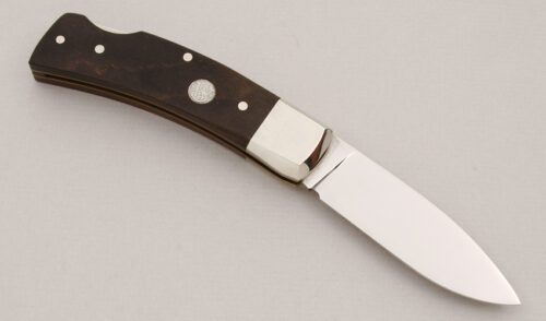 Smith & Wesson 6060 Blackie Collins Lockback with Wessonwood Scales handle material - Obverse Side - Item #KLC15037