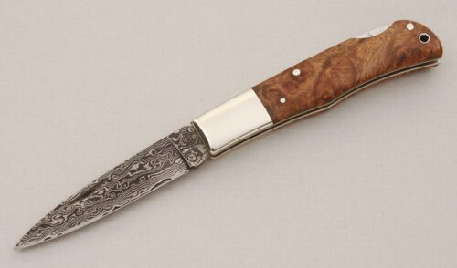 A.G. Russell Damascus Lockback with Quince Wood Scales handle material - Obverse Side - Item #KLC15047