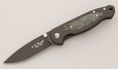 A.G. Russell Greased Light'n with Black Aluminum Frame handle material - Obverse Side - Item #KLC15079