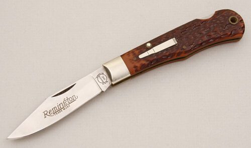 Remington Knives Model R1303 Bullet Lockback with Brown Jigged Bone Scales handle material - Obverse Side - Item #KLC15242