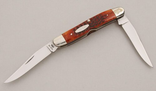 Case Cutlery Muskrat Folder with Red/Brown Jigged Bone Scales handle material - Obverse Side - Item #KLC15275