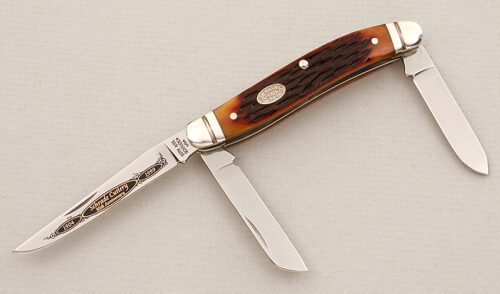 Schrade Cutlery 95th Anniversary Stockman with Brown Jigged Bone Scales handle material - Obverse Side - Item #KLC15309