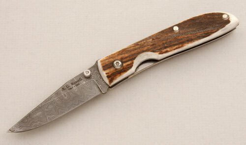 A.G. Russell 2999 Voyager Folder with Stag Scales handle material - Obverse Side - Item #KLC15449