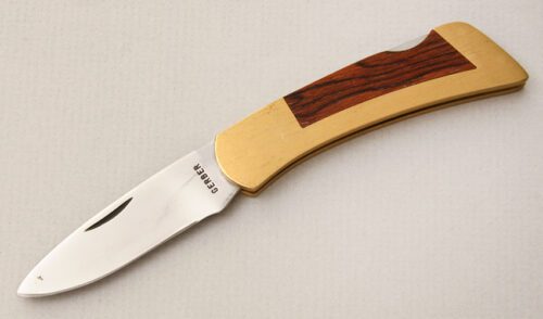 Gerber Knives Small Sportsman Lockback with Brass Frame handle material - Obverse Side - Item #KLC15476