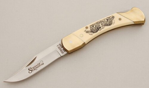 Schrade Cutlery SC507 Scrimshaw Lockback with Ivory Delrin Scales handle material - Obverse Side - Item #KLC15520