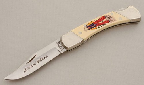 Schrade Cutlery Cowboy Commemorative Scrimshaw with Ivory Micarta Scales handle material - Obverse Side - Item #KLC15575